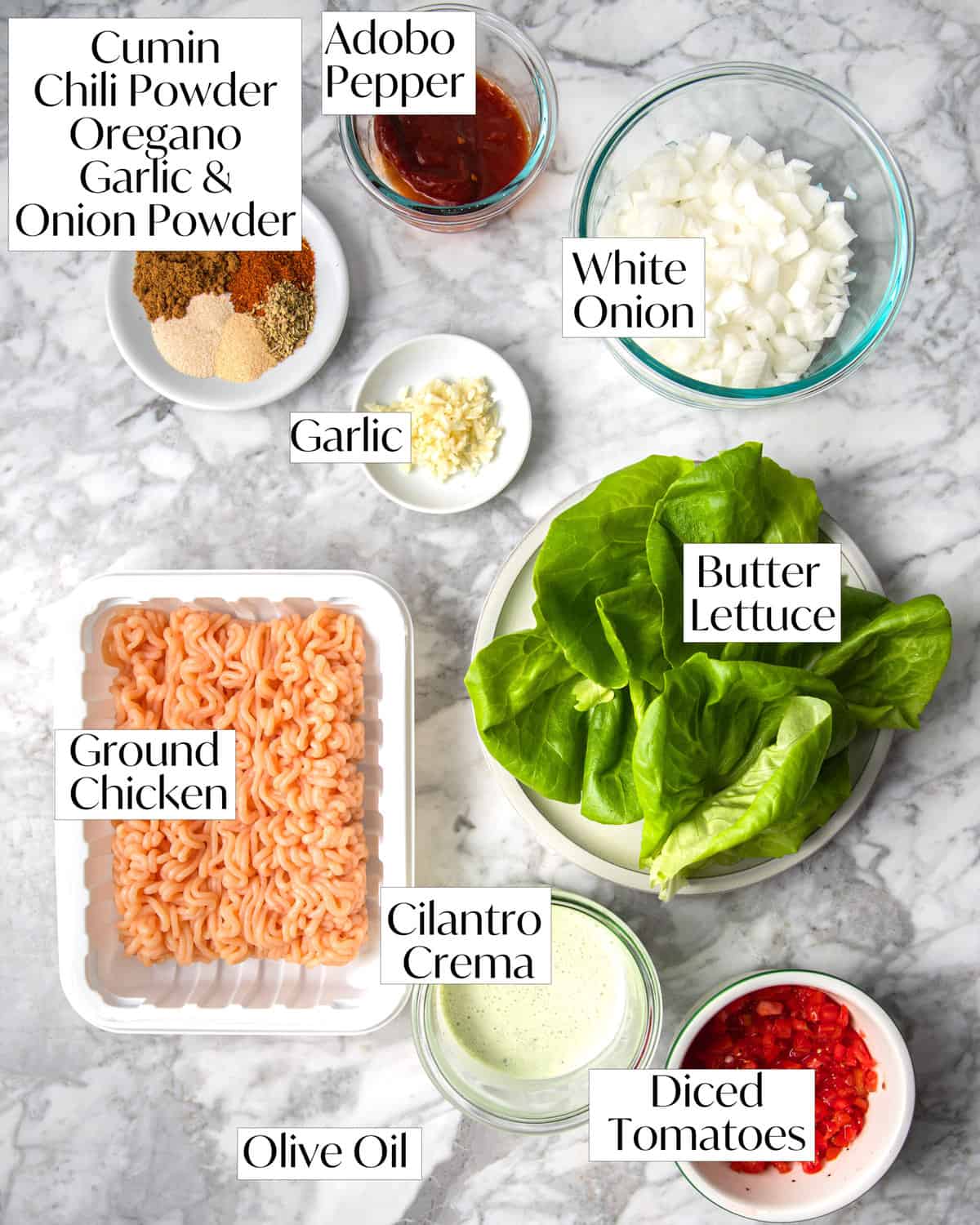 ingredients for ground chicken tacos laying on a counter.