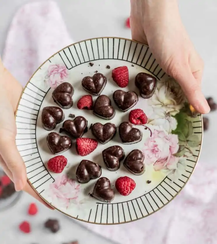 Raspberry Chocolate Truffles on a plate.