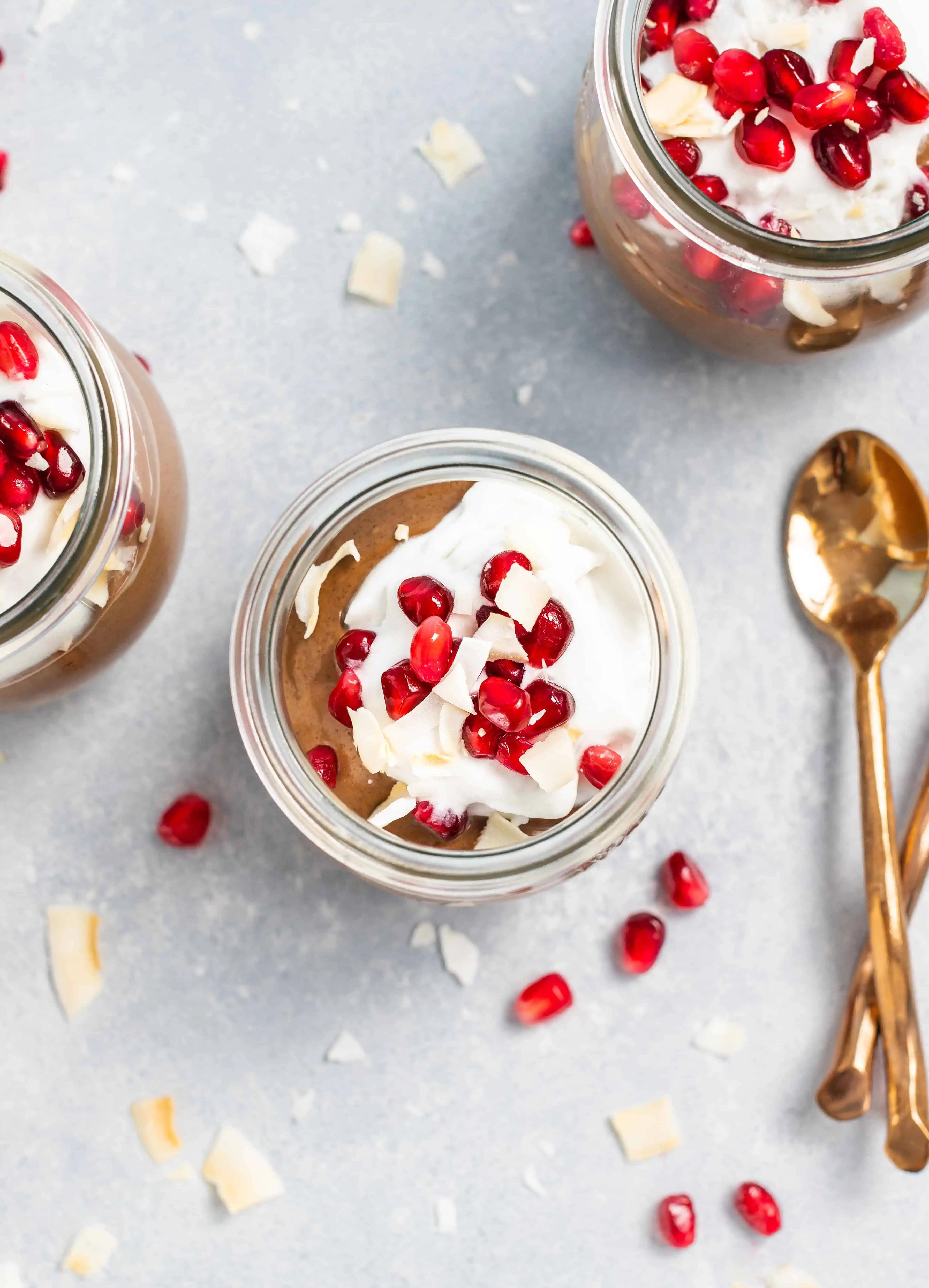 Chocolate Chia Mousse with pomegranates and coconut flakes