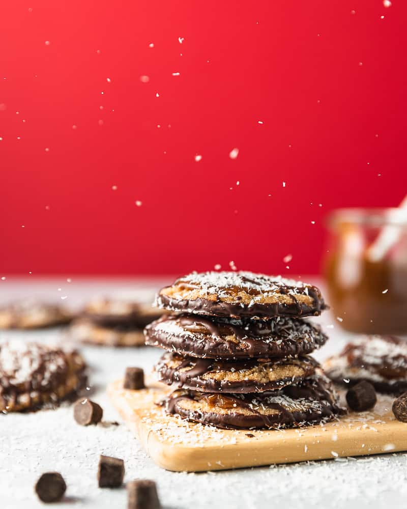 shortbread cookies with caramel, coconut flakes, and chocolate