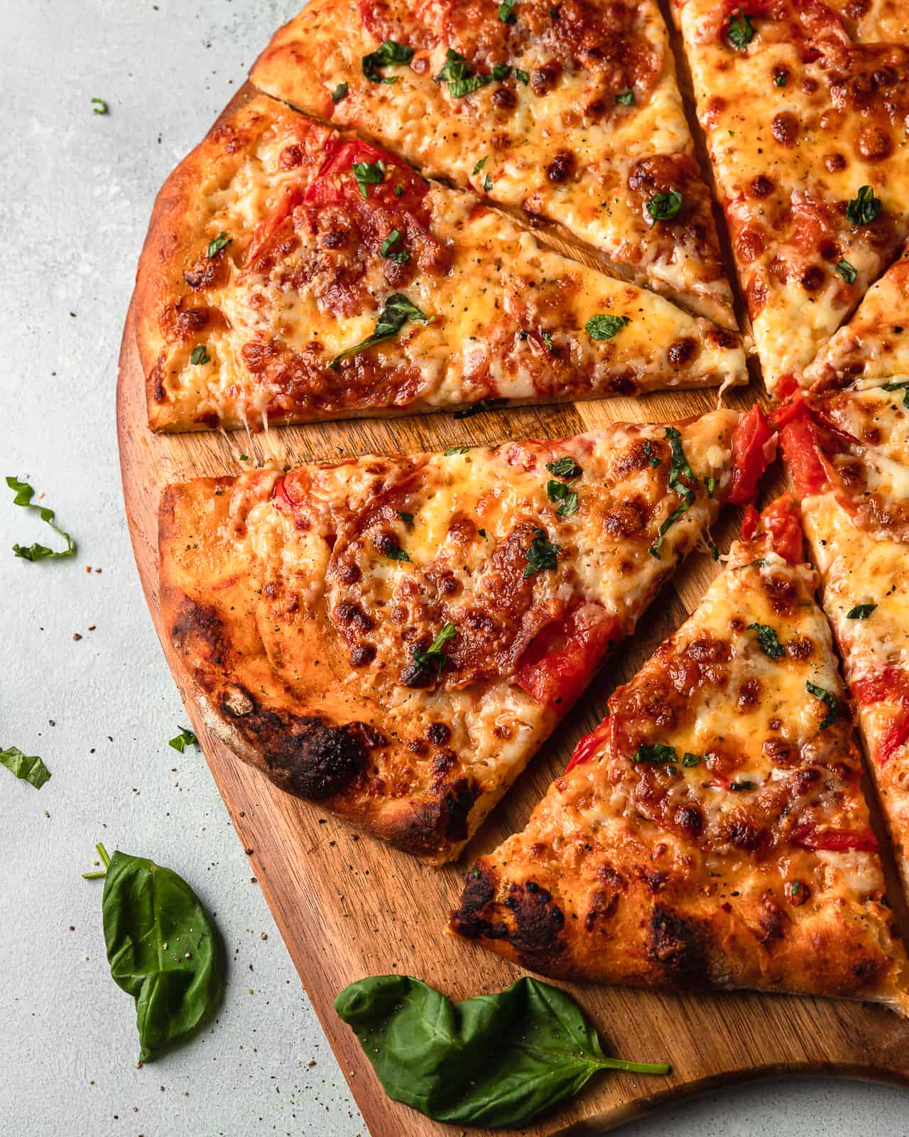 Cheese Pizza with Calabrese and Tomatoes.