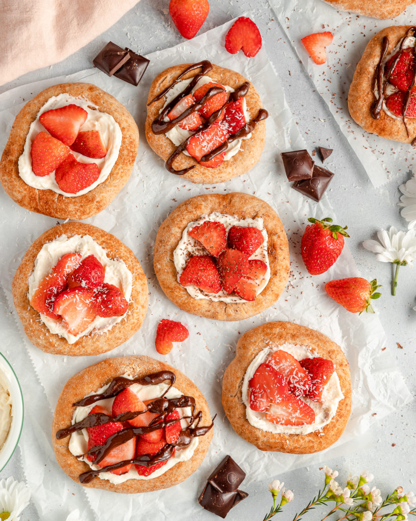 Mini Dessert Pizzas with strawberries, chocolate, and coconut flakes