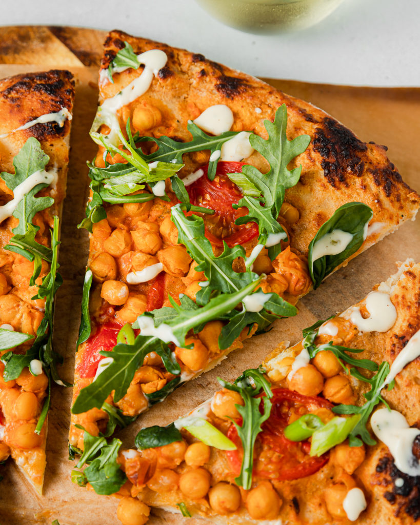 Slice of Pizza with buffalo chickpeas and ranch 
