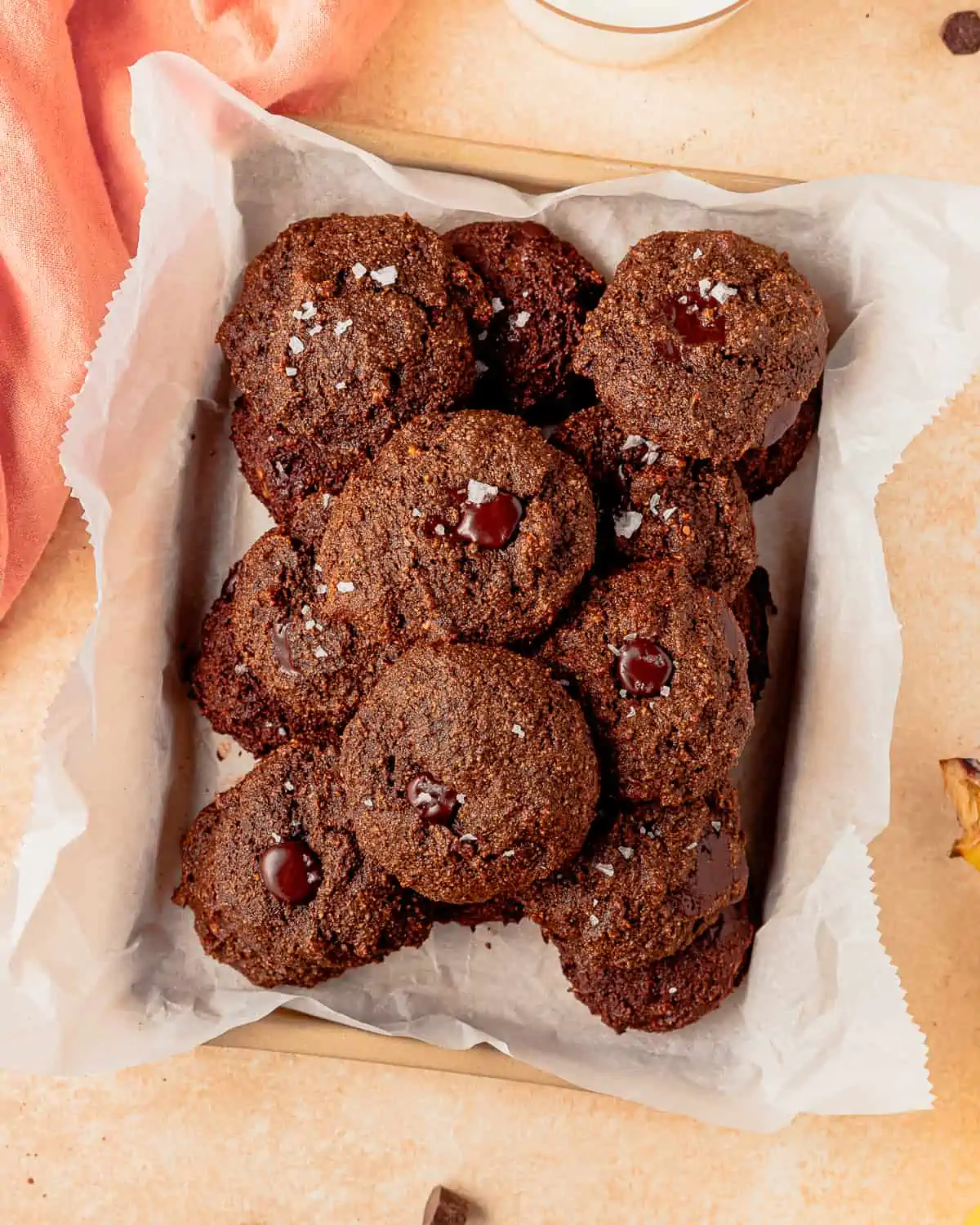Banana Chocolate Cookies in a pan with puddles of chocolate.