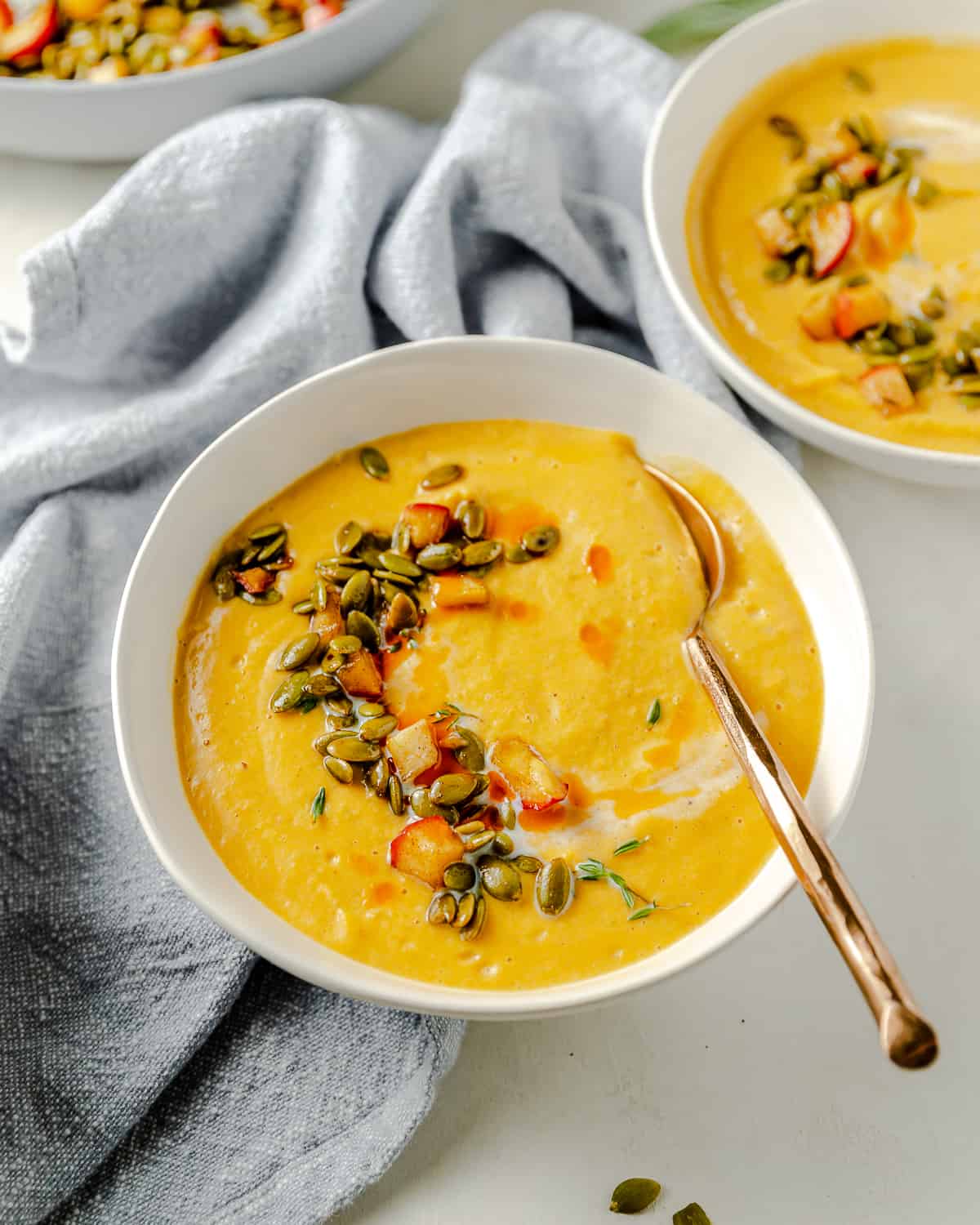 Roasted Butternut Squash Soup with toasted Pepita seeds on top.