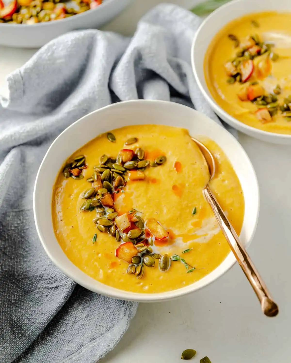 Roasted Butternut Squash Soup with toasted Pepita seeds on top.