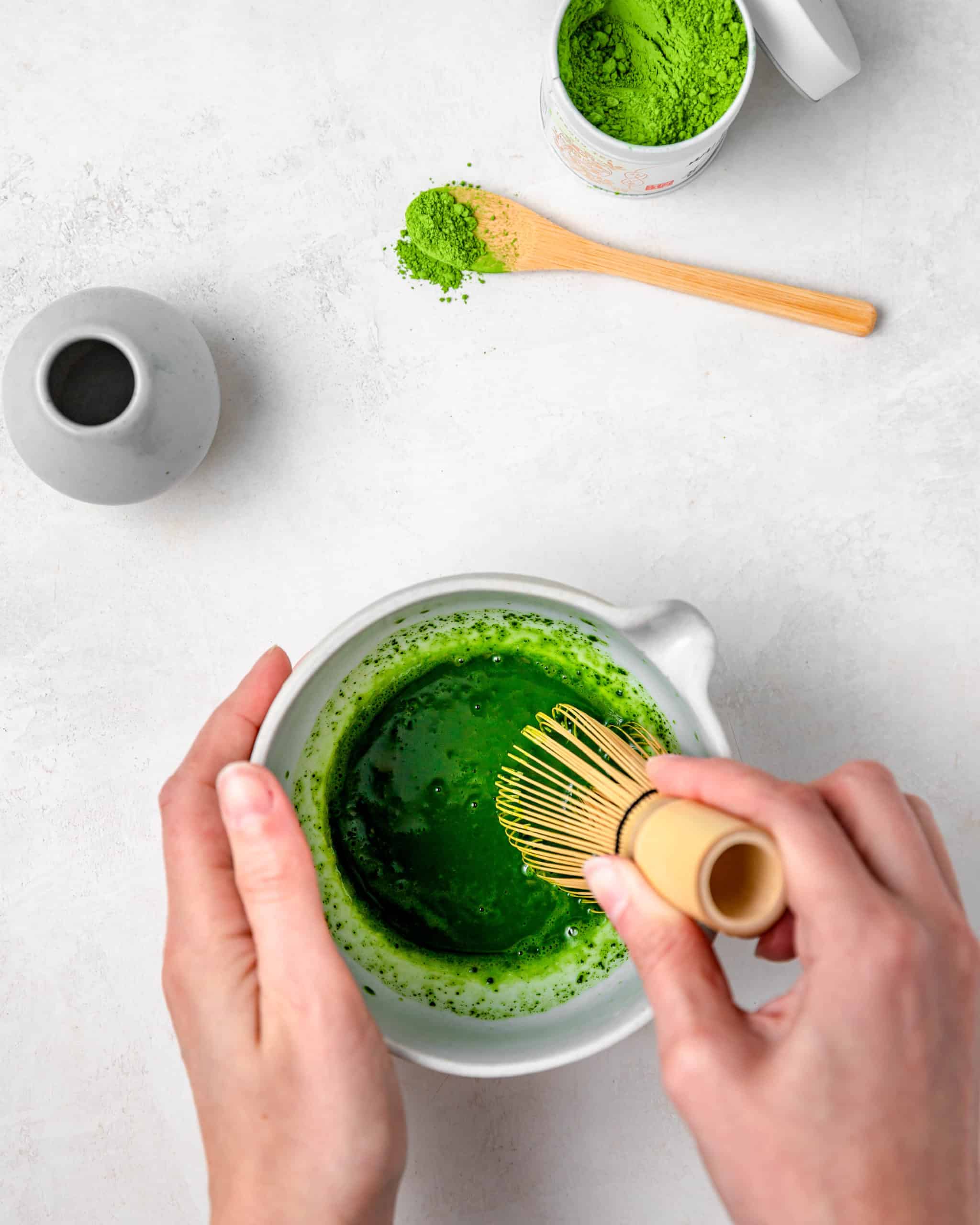 Mixing Matcha with hot water