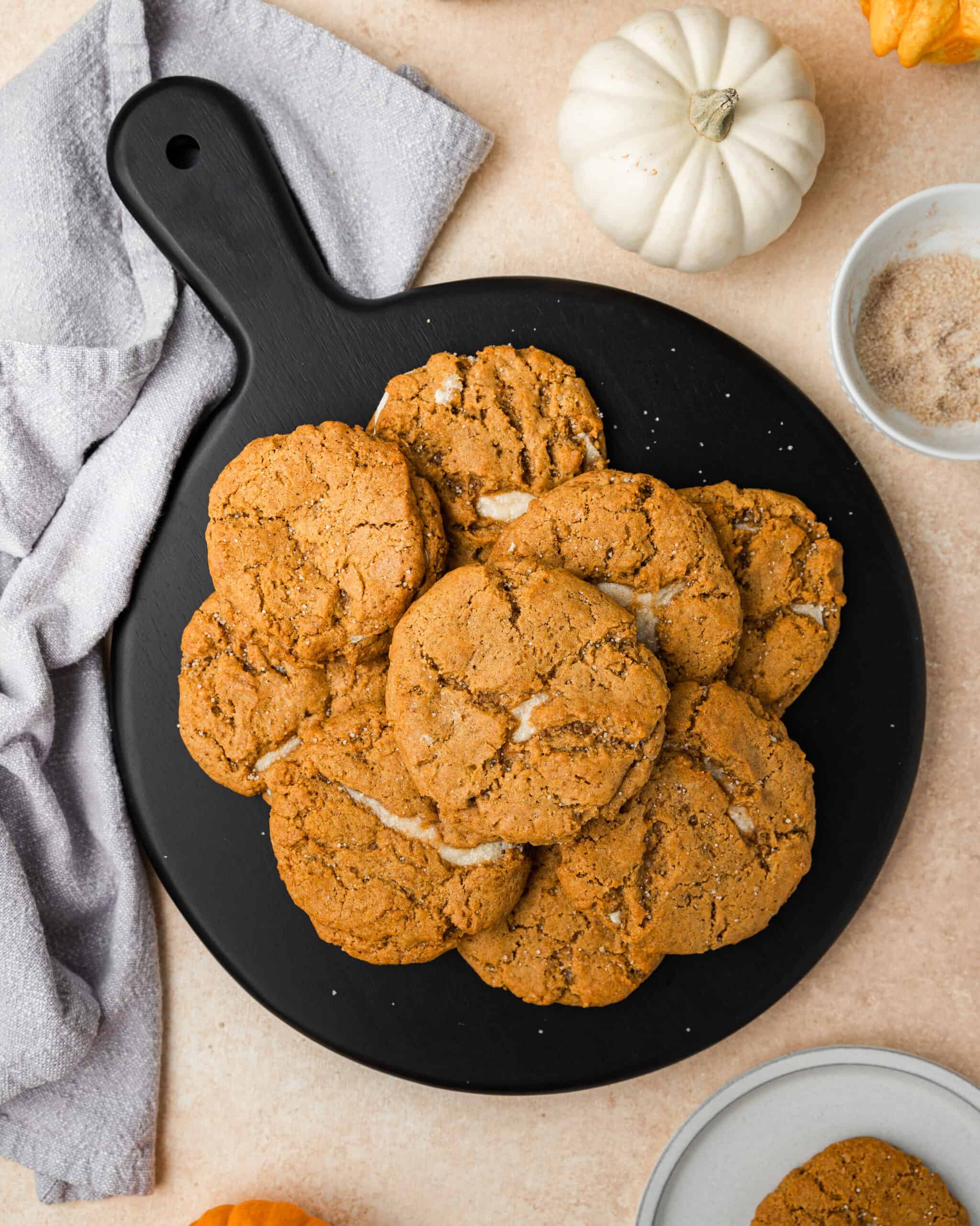 pumpkin cheesecake cookies on a platter.